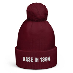 The Tractor Mugs Store Burgundy Case IH 1394 | Pom-Pom Beanie Quality Farmers Merch