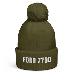 The Tractor Mugs Store Moss Green Ford 7700 | Pom-Pom Beanie Quality Farmers Merch