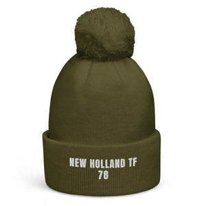 The Tractor Mugs Store Moss Green New Holland TF 78 | Pom-Pom Beanie Quality Farmers Merch